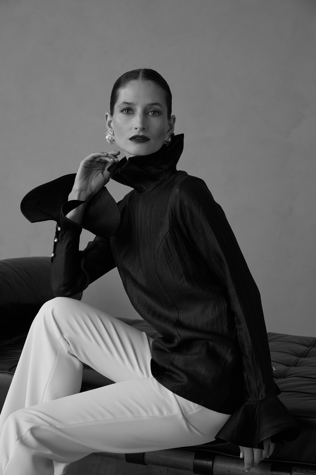 Fall 2026 tailoring, black blouse and ivory trousers, black
and white
