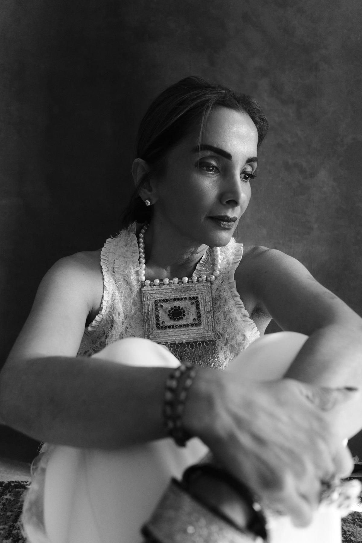 Veena Chauhan, founder and creative director, portrait in black and white